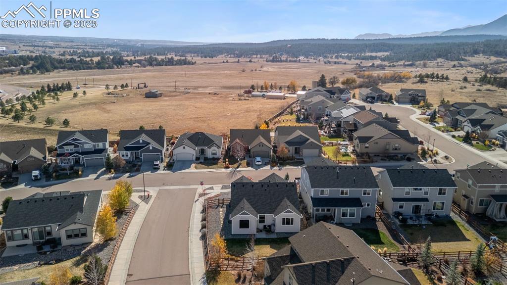 Aerial view of residential area with mountains