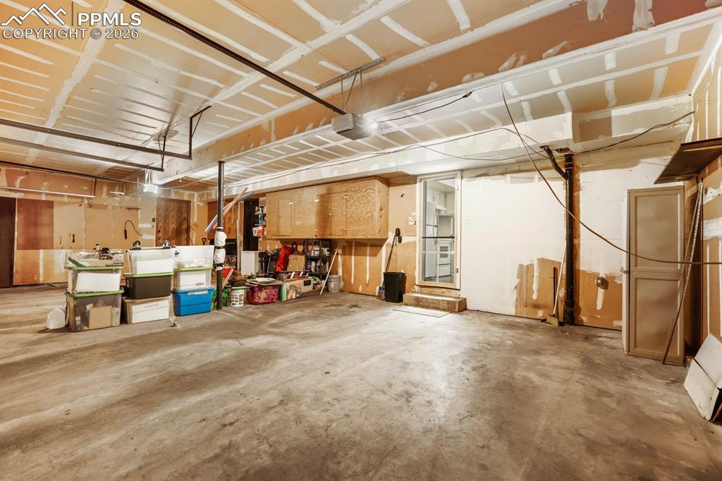 Attached shared garage with door opener.