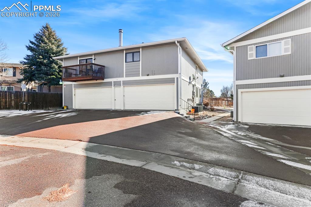 Attached shared garage in the back of the unit.