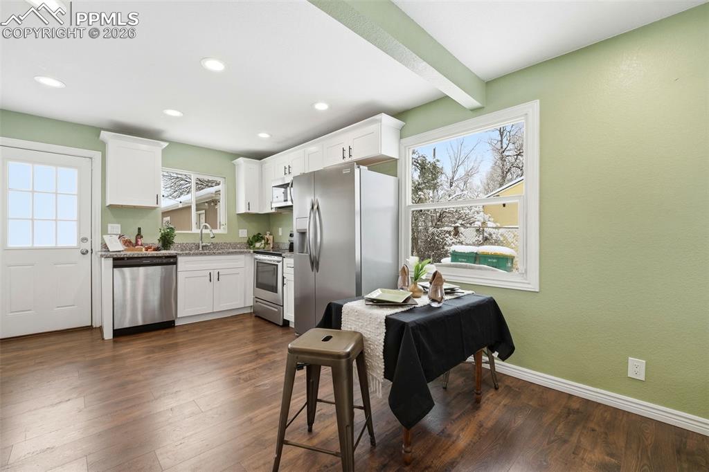 Open & brigt with entry door to rear yard