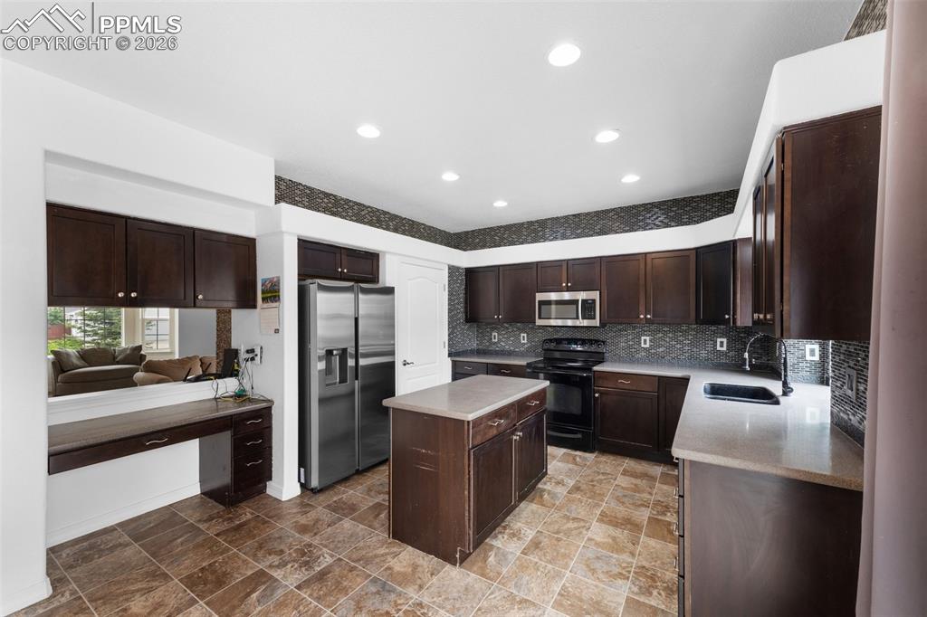 Spacious Kitchen with Pantry and Walkout