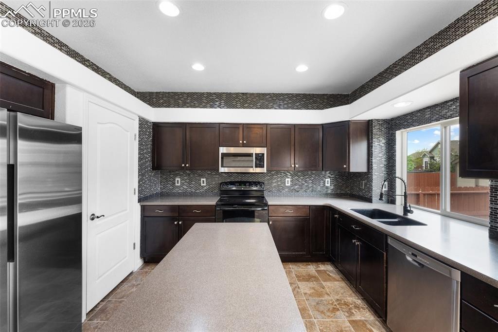 Spacious Kitchen with Pantry and Walkout