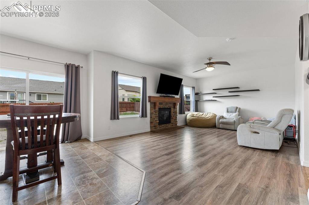 Dining Area with Walk-out and Main Level Family Room with Gas Fireplace
