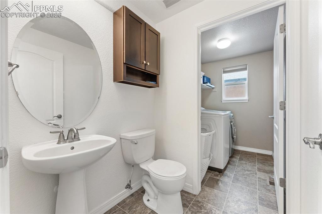 Main Level Half-Bath and Laundry Room 