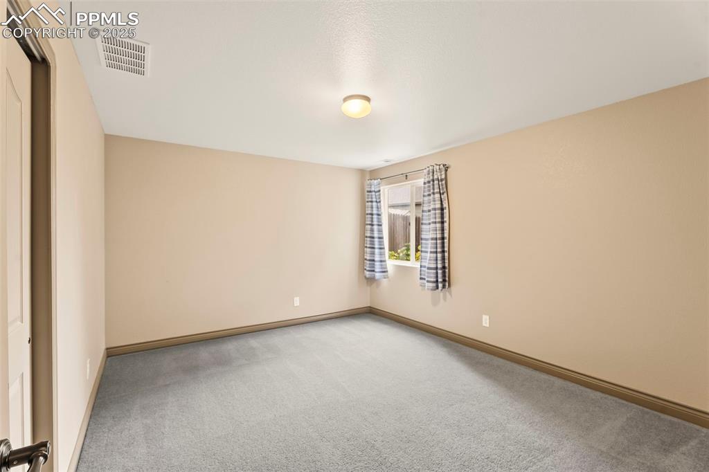 Bedroom 1 in basement. 