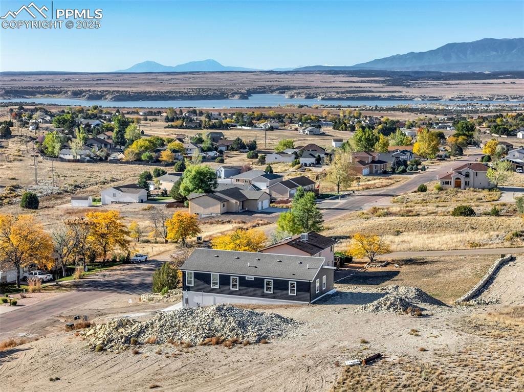 Area Overview – Stunning views of Lake Pueblo with rolling terrain and open skies, ideal for those seeking proximity to outdoor recreation.
