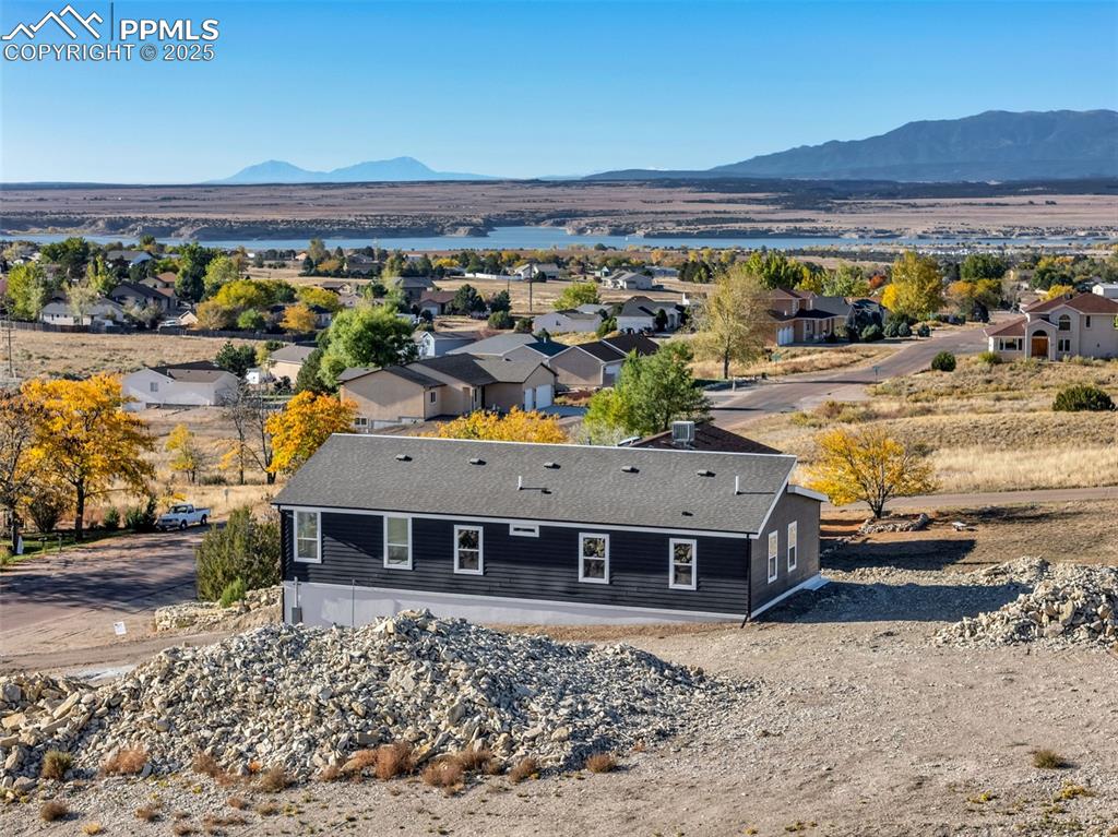 Area Overview – Stunning views of Lake Pueblo with rolling terrain and open skies, ideal for those seeking proximity to outdoor recreation.