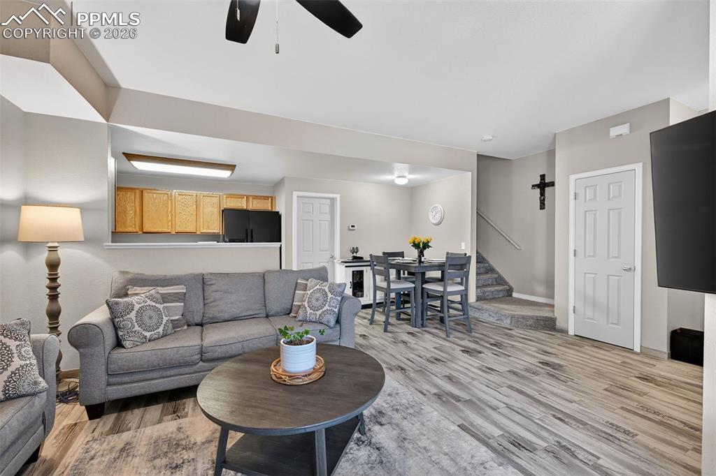 View from the living room, hall closet and stairway to upstairs area. 