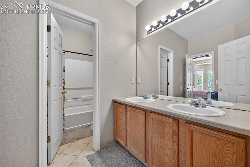 Upstairs bathroom with double vanity