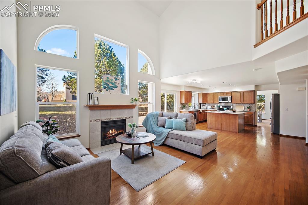 2 story ceiling, gas fireplace and huge picture windows for tons of natural light. 