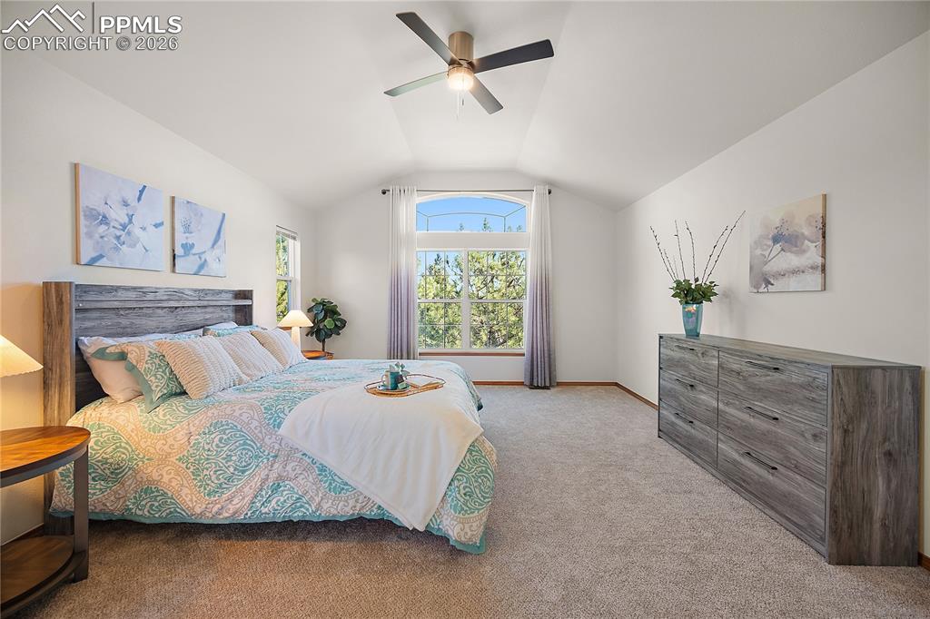 Spacious master with vaulted ceilings, attached 5 piece bath and huge walk in closet. 