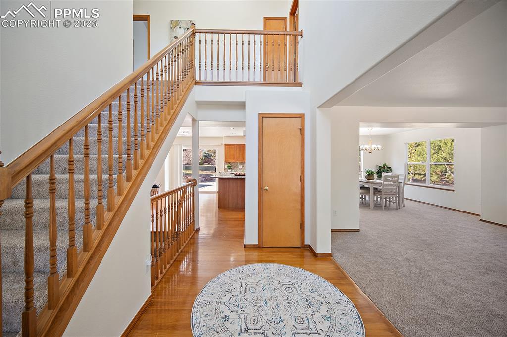 Front entry with hardwood flooring