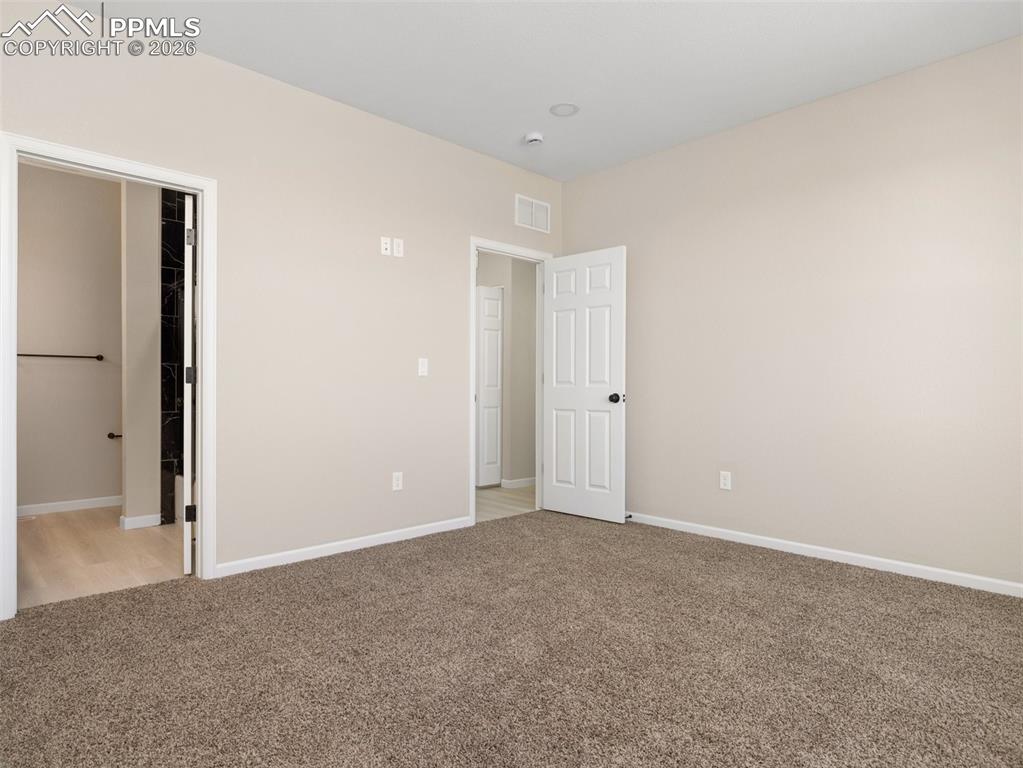 Master Suite and entrance to 5 Piece Master bath. 