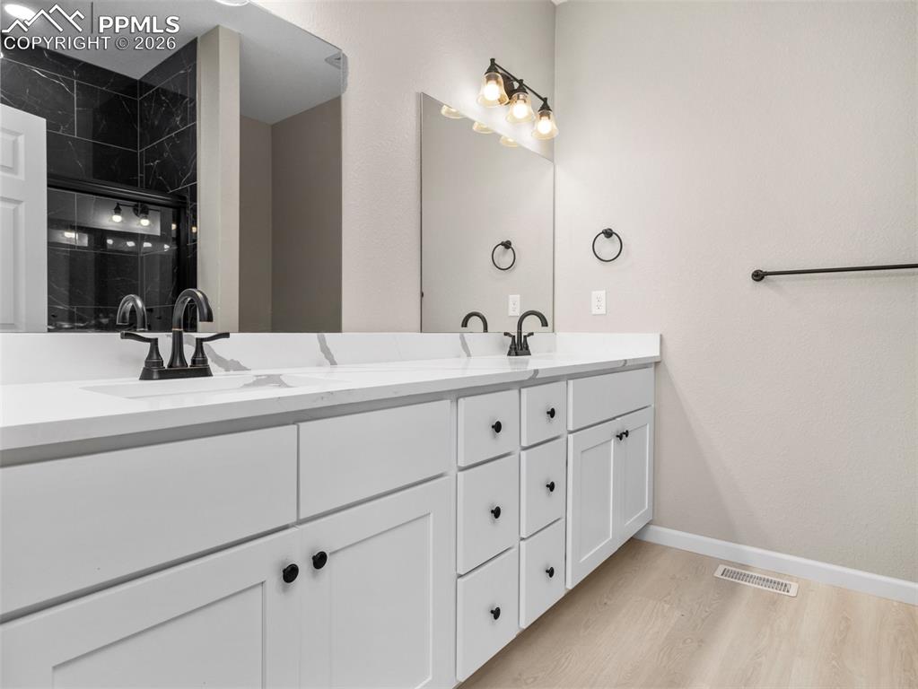 Gorgeous Master bath with double vanity and quartz countertops.
