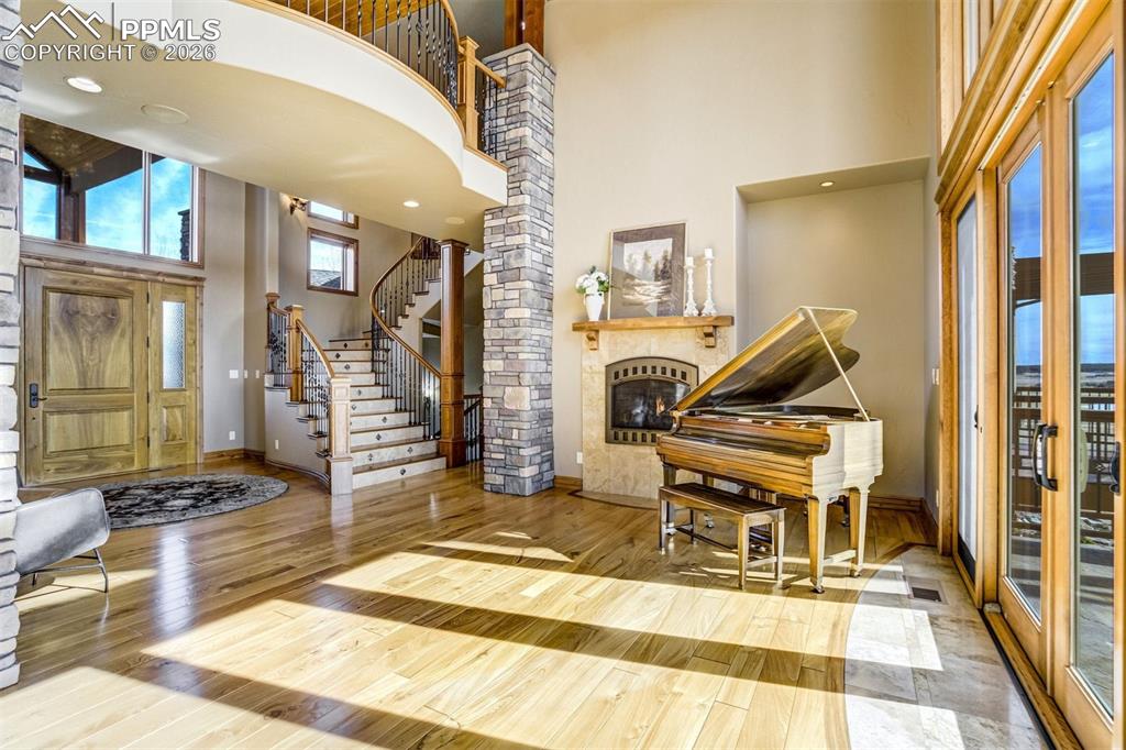 Step inside to a grand entry where timeless architecture and natural light welcome guests and set the tone for the craftsmanship found throughout the estate