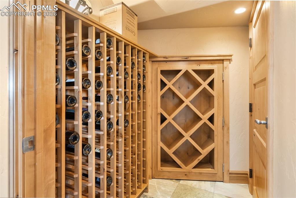 A dedicated wine cellar provides the perfect environment to store and showcase your favorite vintages, ready for celebrations both large and small