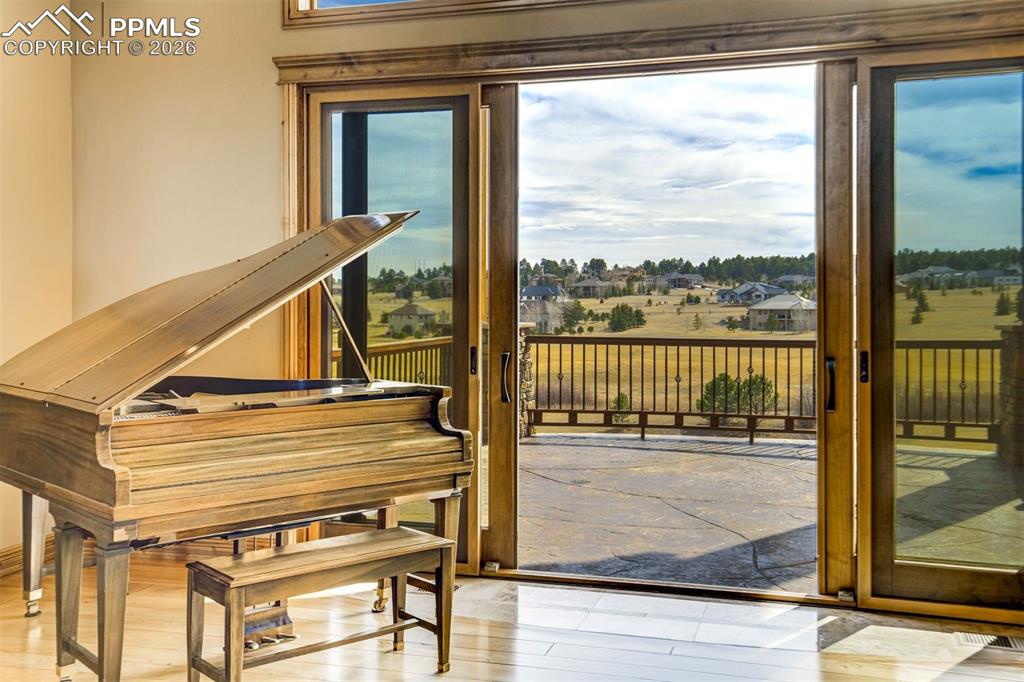 How could one not be inspired by this view? A perfect place to entertain, practice, or perform—while the golf course, open skies, and wandering wildlife become your audience