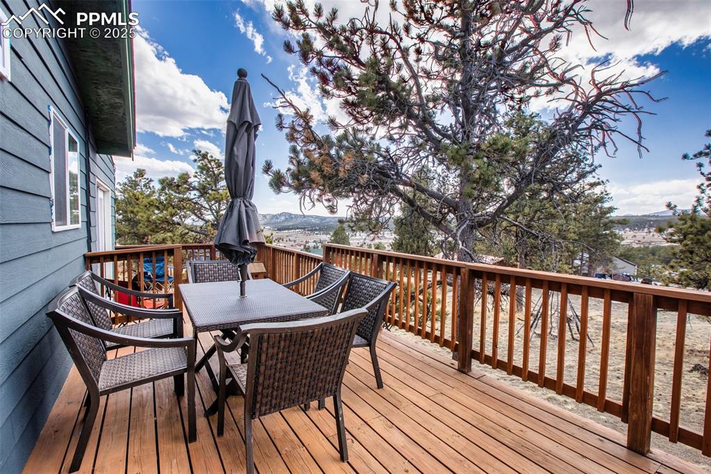 Wooden terrace with outdoor dining space