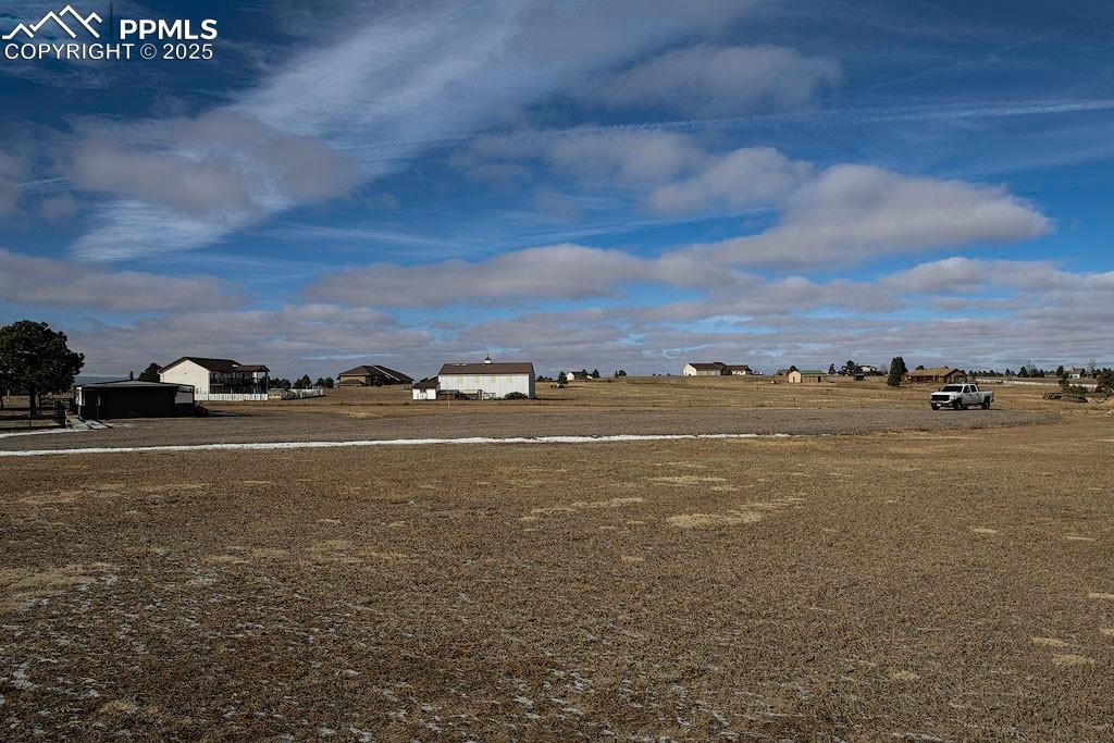 Back of property with detached garage