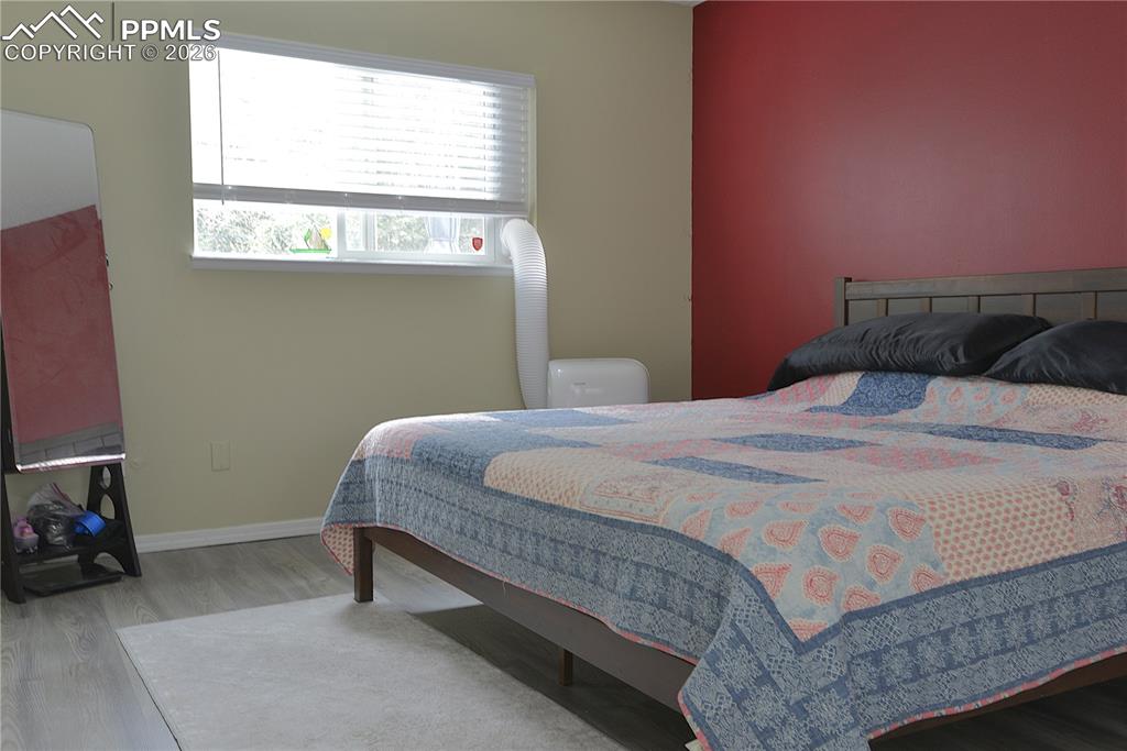 Primary bedroom is on the back of the home, overlooking a private treed lot - you'll feel like you are in a treehouse here.