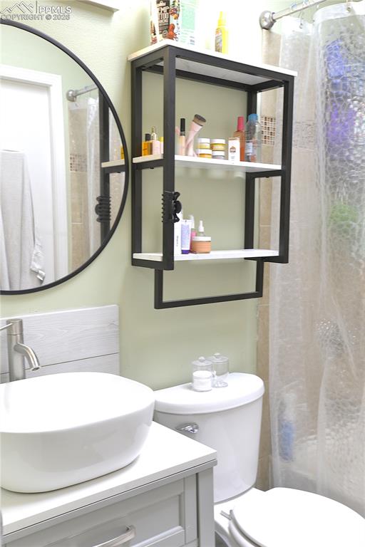Shared Main Level bathroom with skylight is bright and cheery.