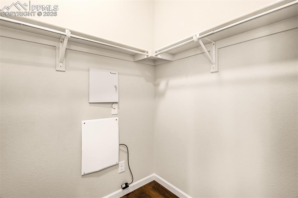 Primary bedroom walk-in closet