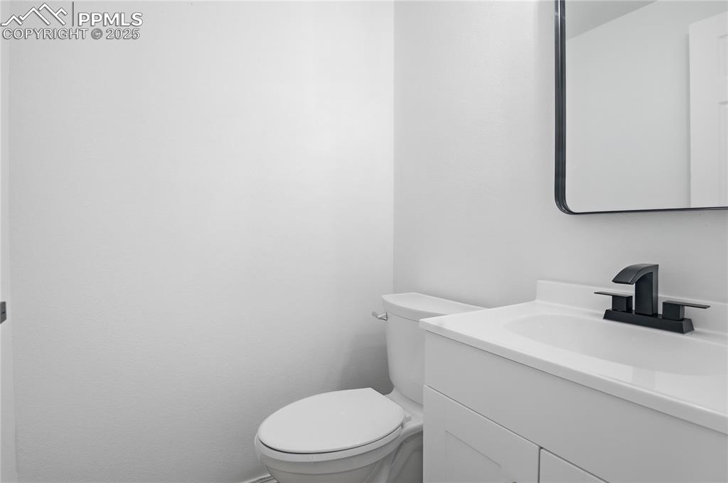 Bathroom with vanity and toilet