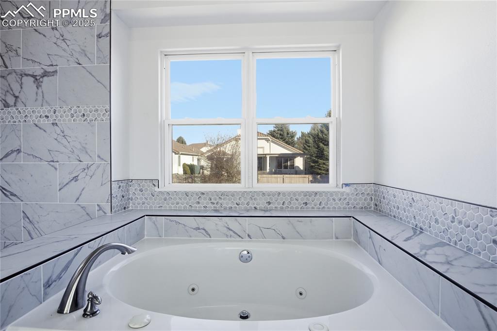 Bathroom featuring a jetted tub
