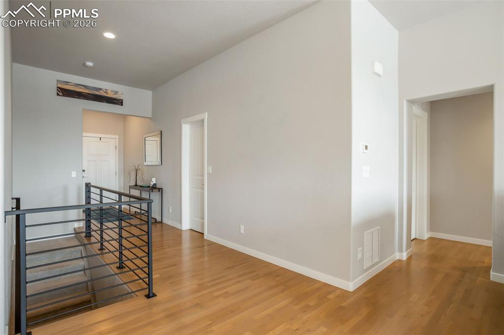 Front door entry and hallway. The 2 doors in the center of the house enter the laundry room.