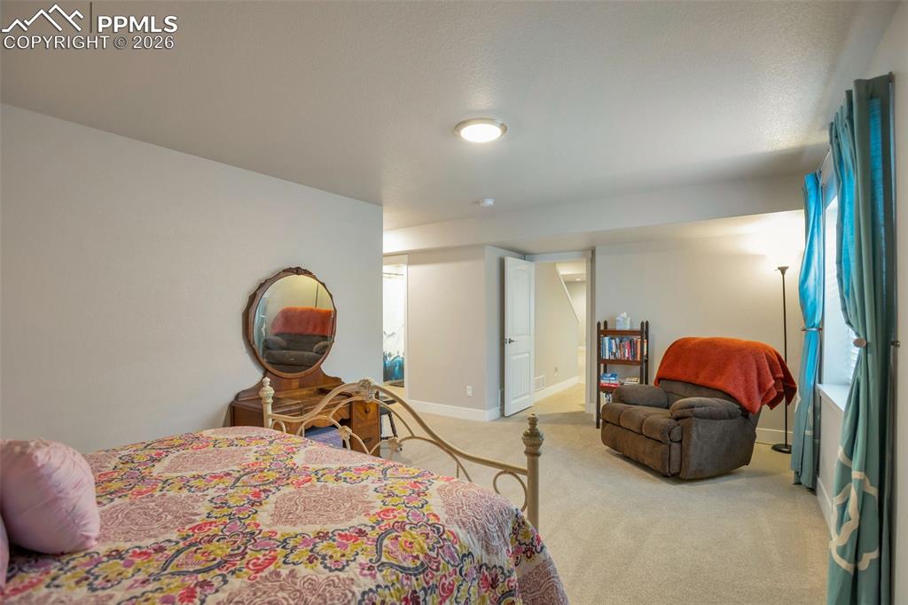 Primary Bedroom #2 (bedroom #3) in Basement with walk-in closet and private bathroom