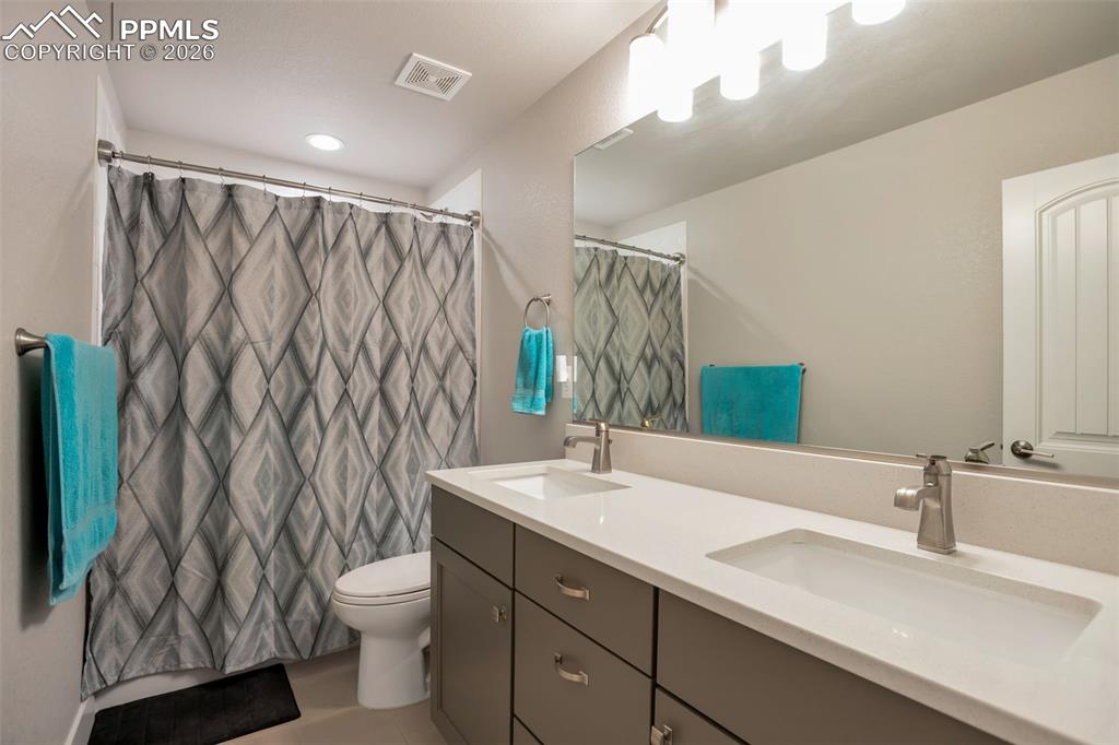 Basement Bathroom #4 (used for Bedroom #4 & 5) with double vanity for the 2 bedrooms