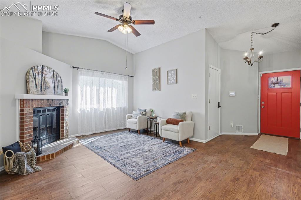 Living room looking back towards front door and garage access door