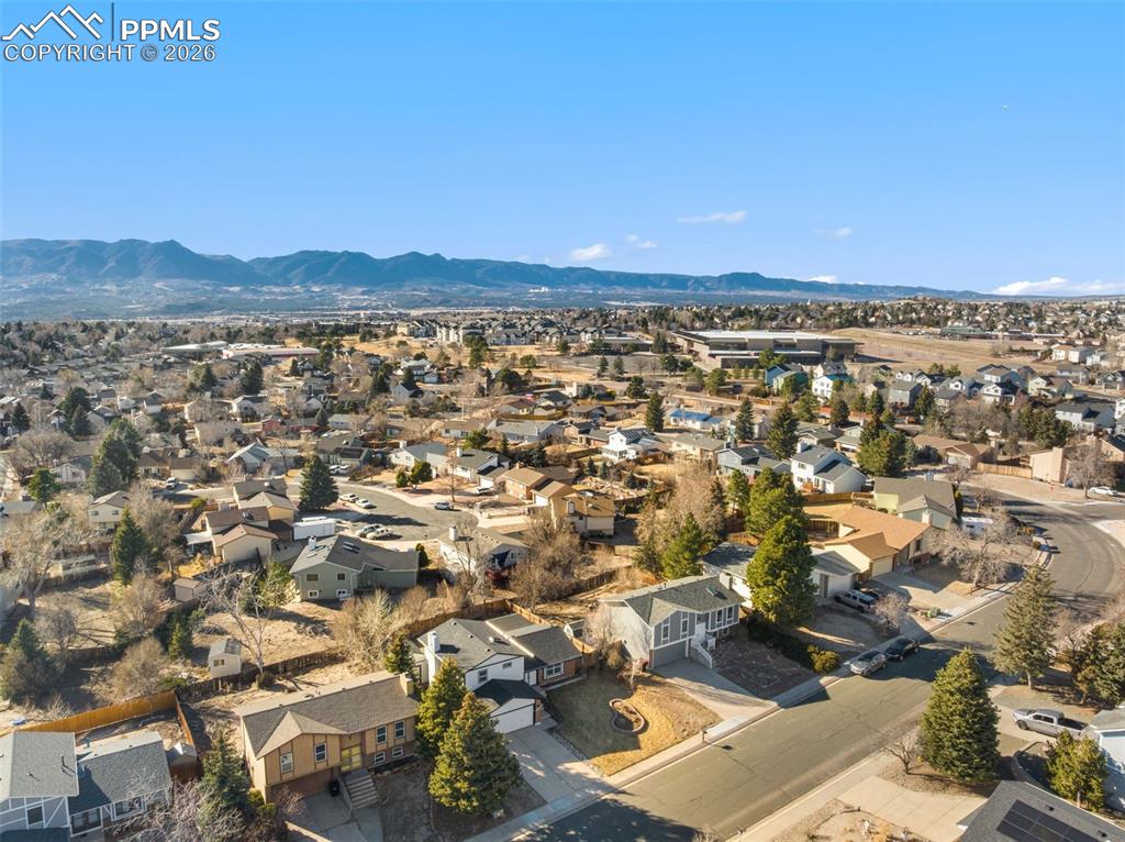 Aerial view of residential area with a mountain backdrop