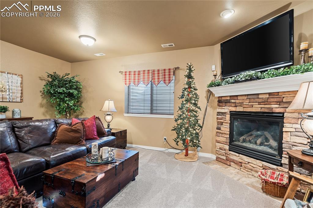 Basement large family room with gas fireplace
