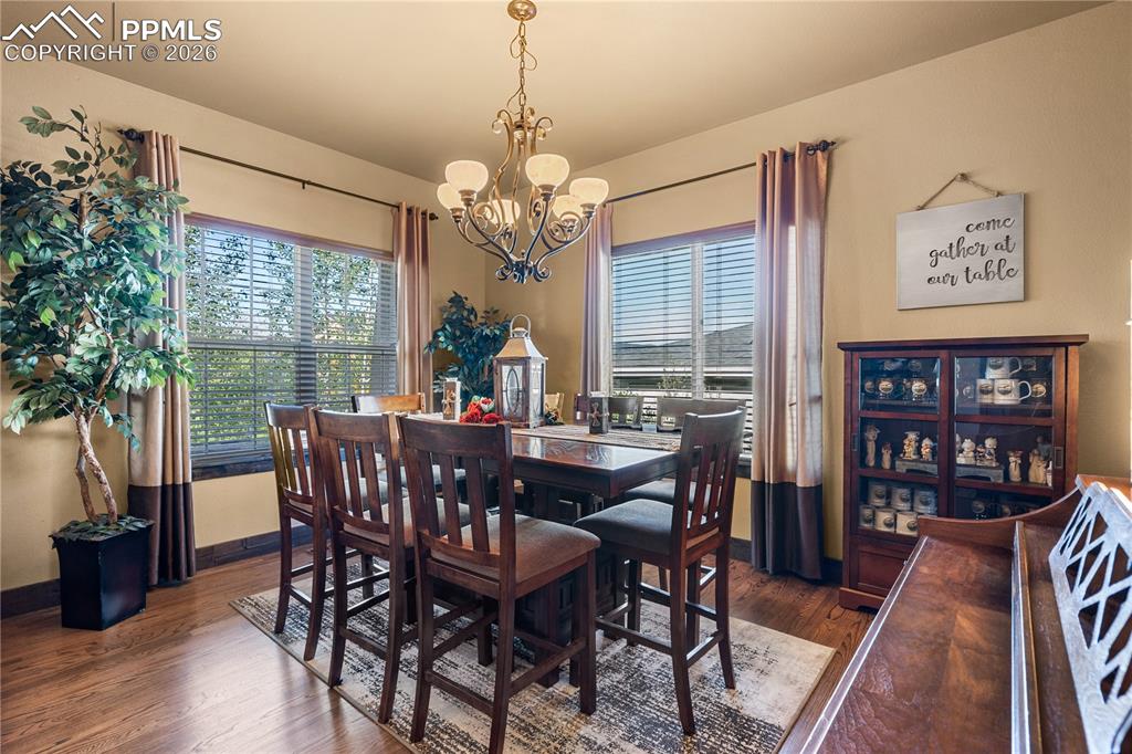 Formal Dining room in from kitchen as you enter the home to your left