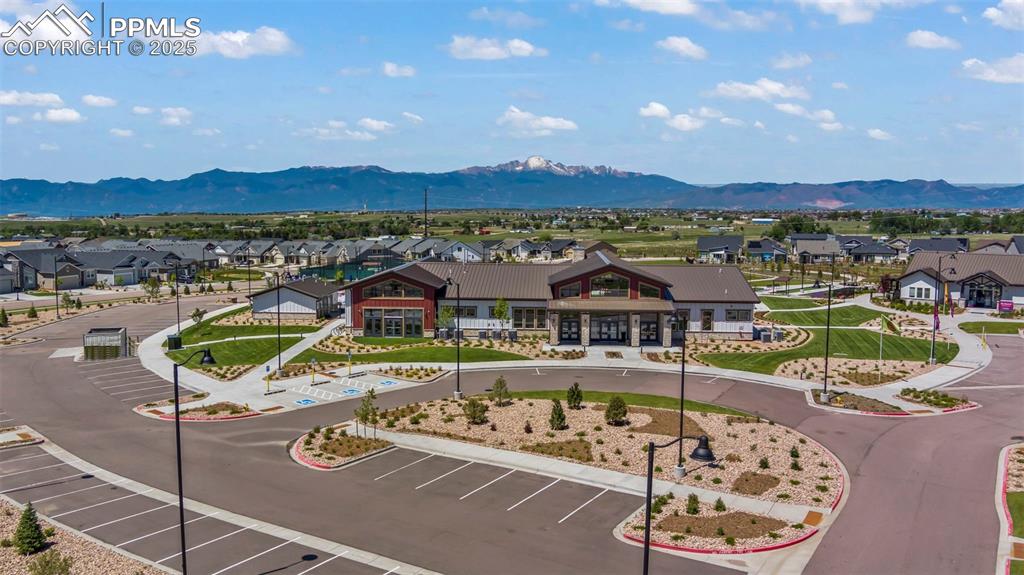 Aerial view of residential area featuring a mountain backdrop