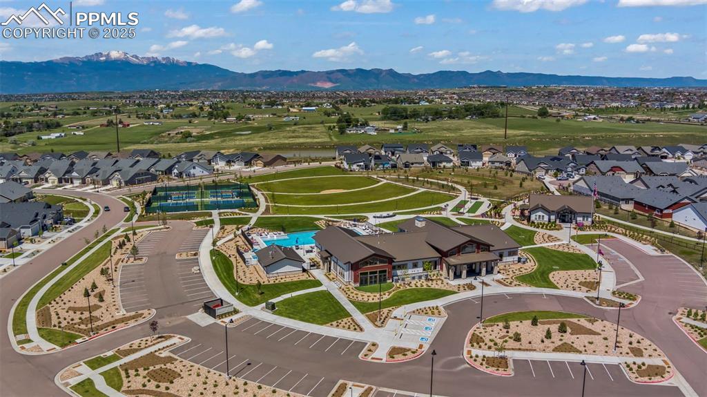 Aerial view of residential area featuring mountains