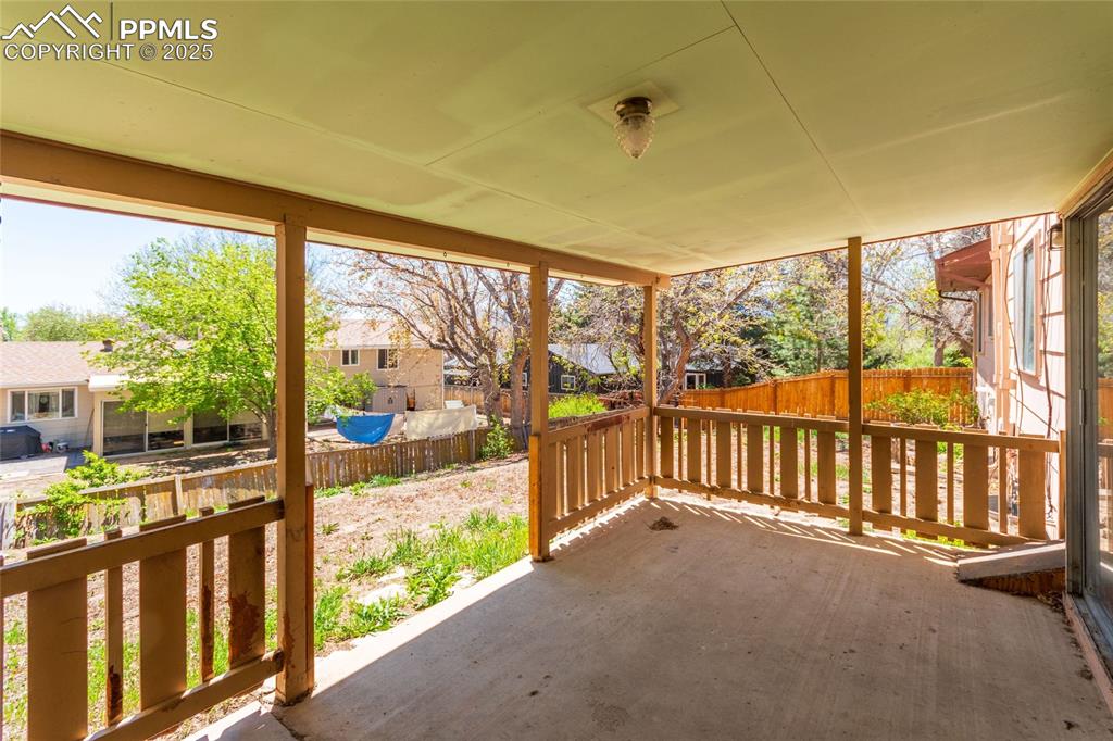 View of patio / terrace featuring fence