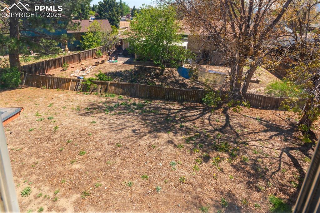 View of yard featuring a fenced backyard