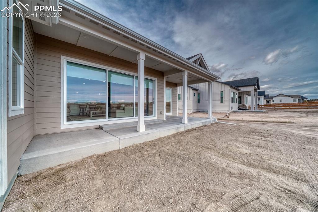 Back of property with a patio area