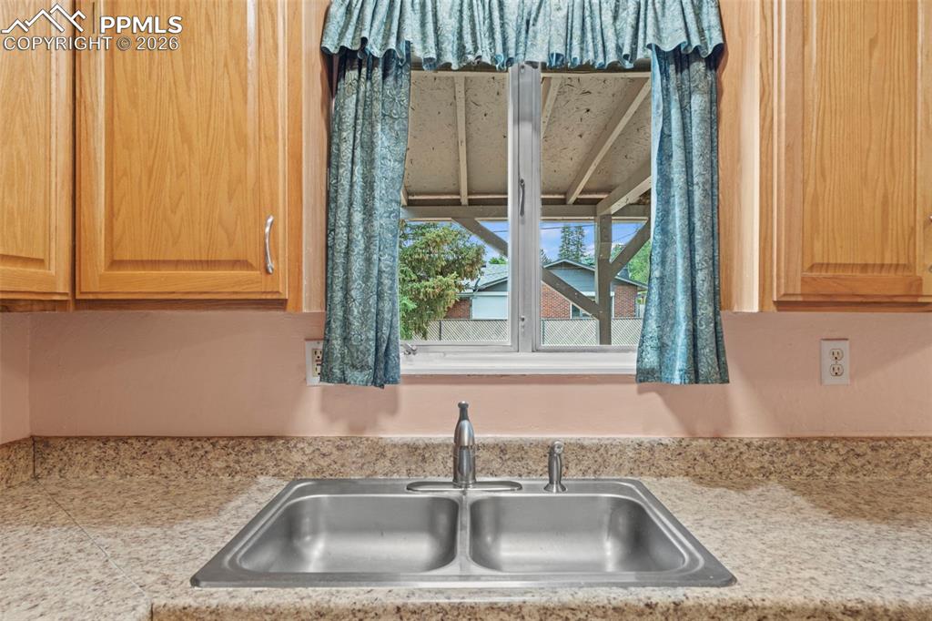 Kitchen featuring a sink