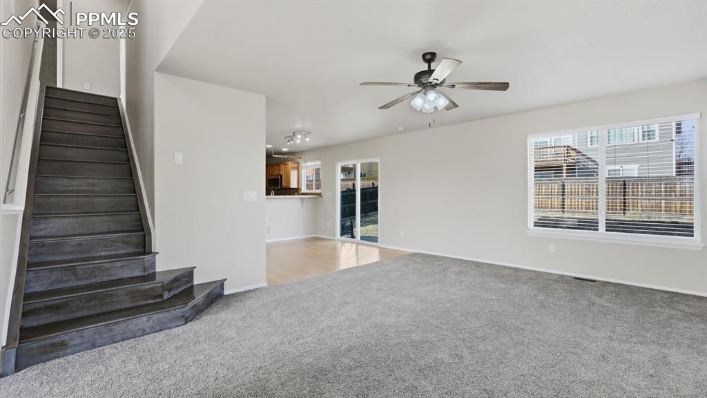 Stairs to the upper level from the Living Room.