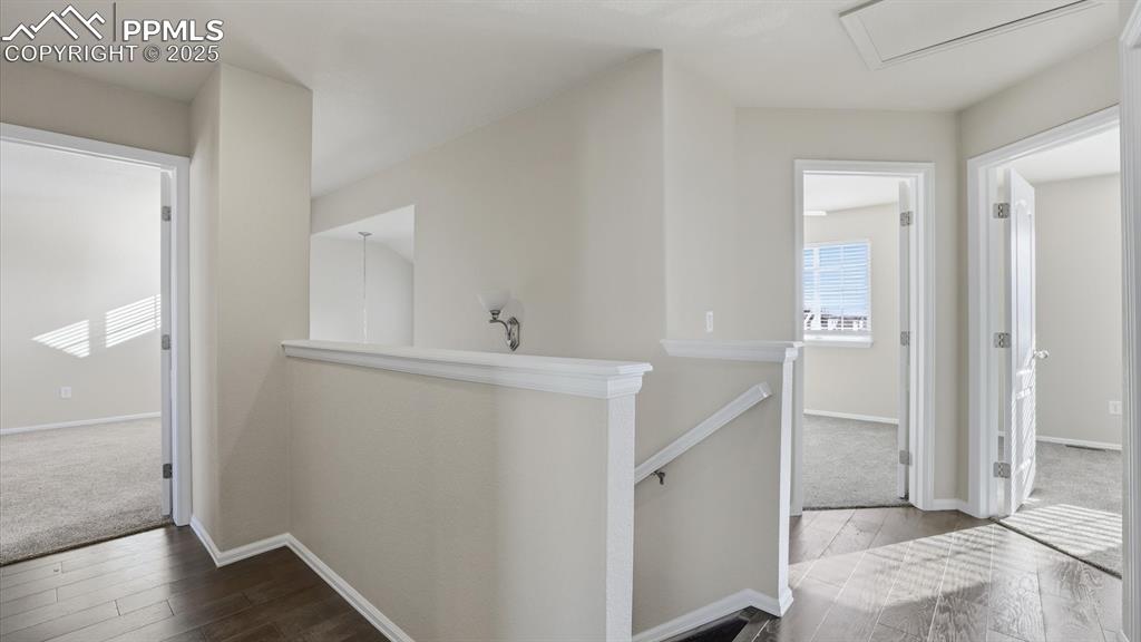 Upper Level hallway with stairs to the main level.