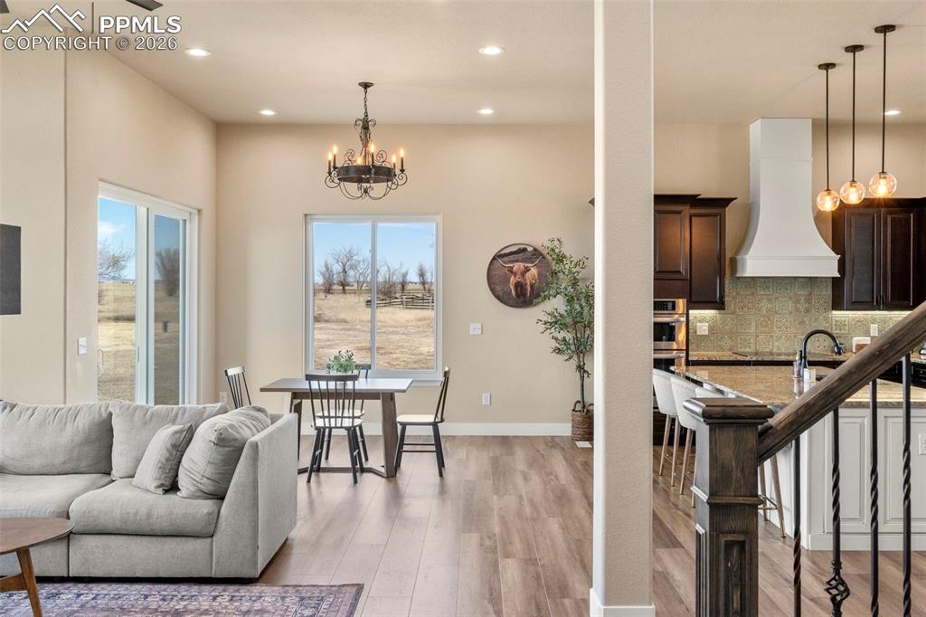 Open concept living area with luxury vinyl floors throughout