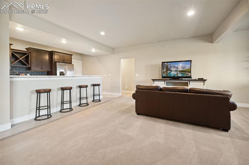 Large lower level family room with kitchenette