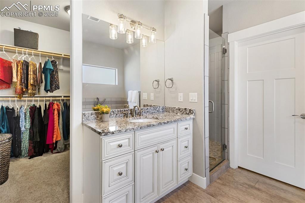 Large walk in closet adjacent to the walk in closet.