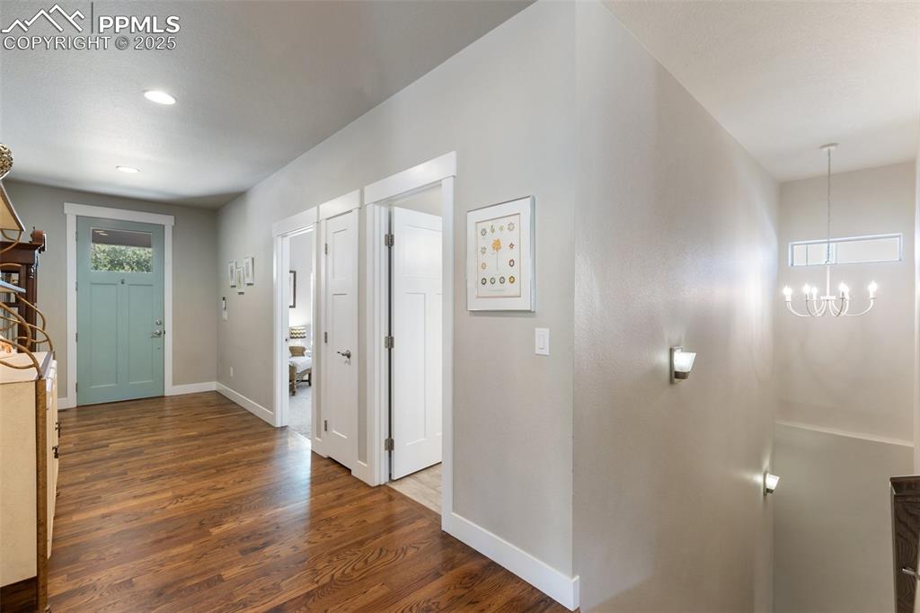 Entry way with hardwood flooring throughout