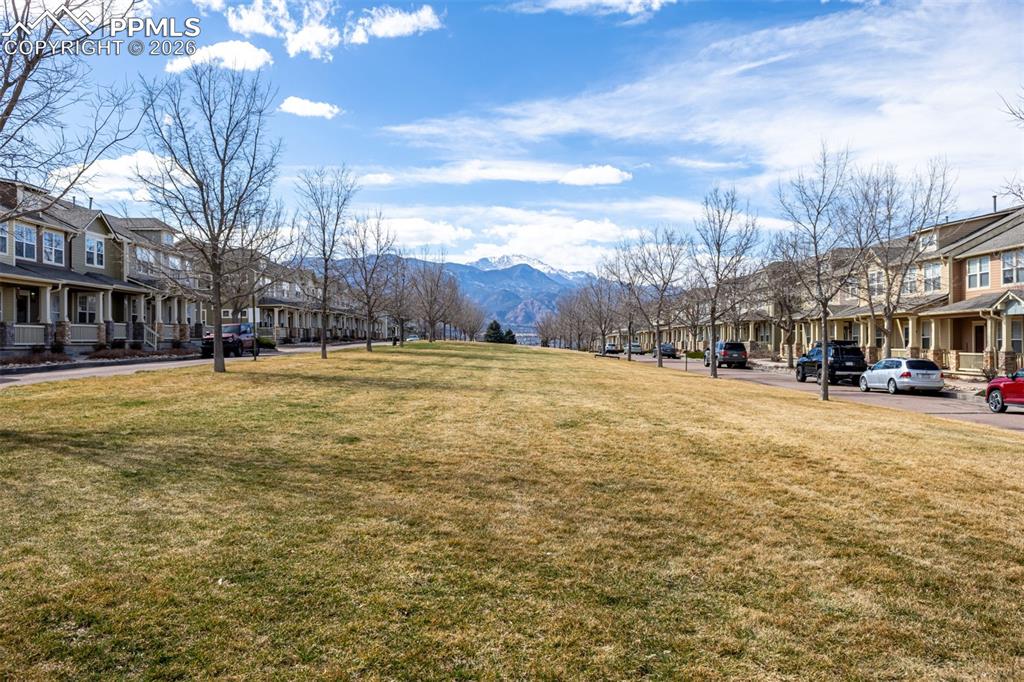 One lot away is this stunning park with unobstructed views of Pikes Peak