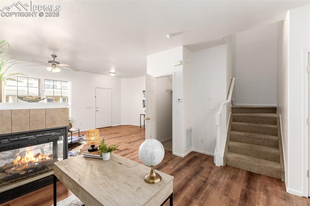 Versatile space adjacent to double-sided gas fireplace