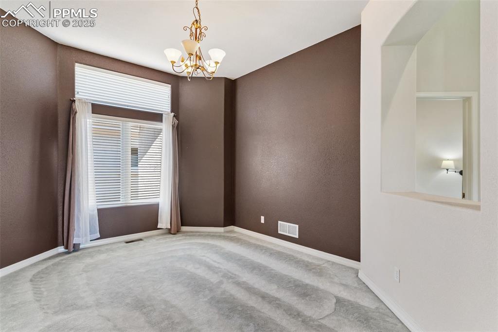 Large open dining room off living room and entry